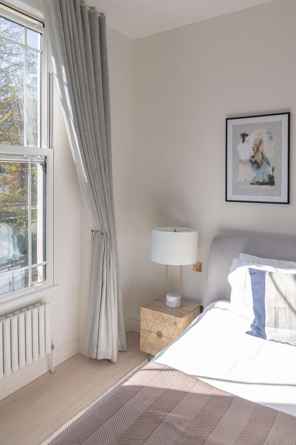 bedroom with bedside cabinet