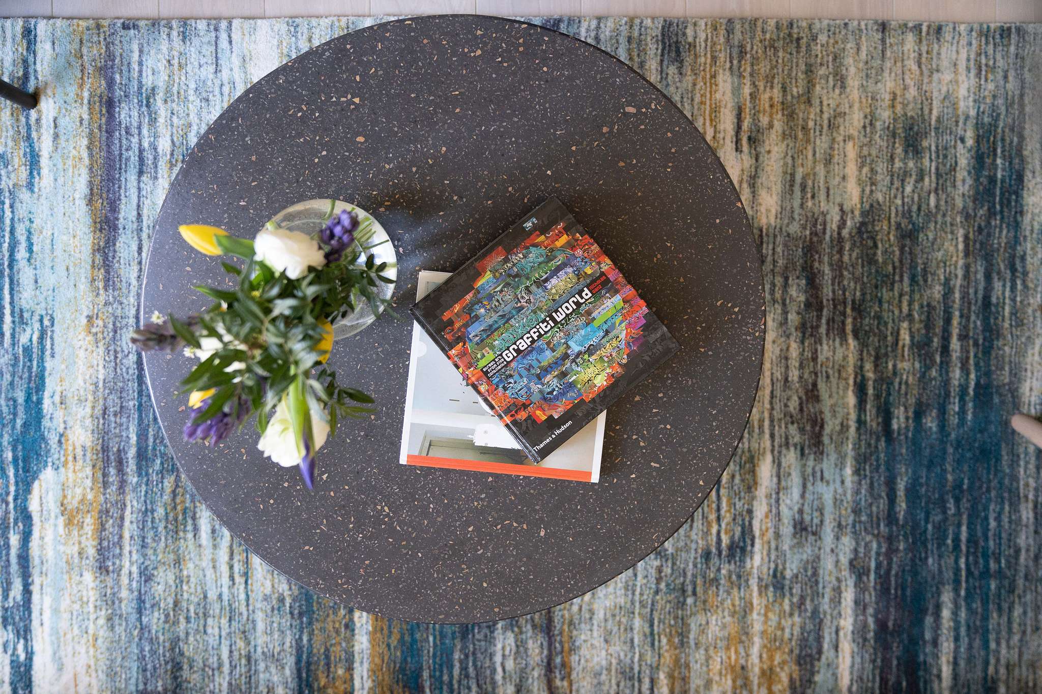 coffee table with books and flowers