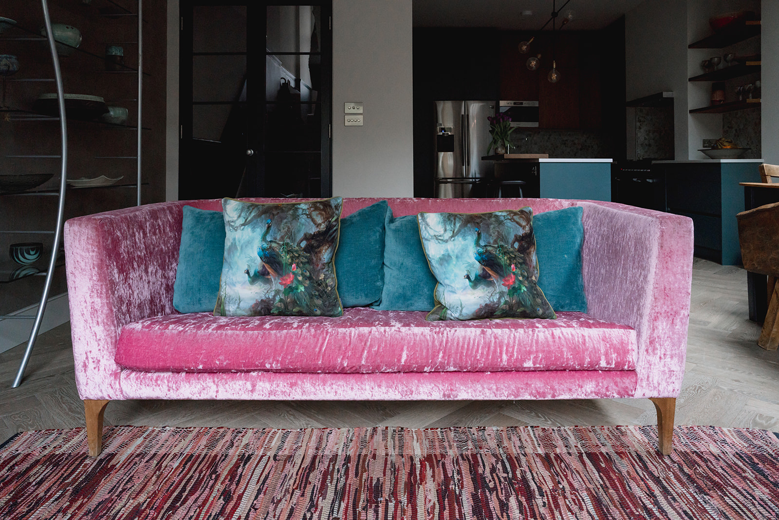 pink sofa with cushions